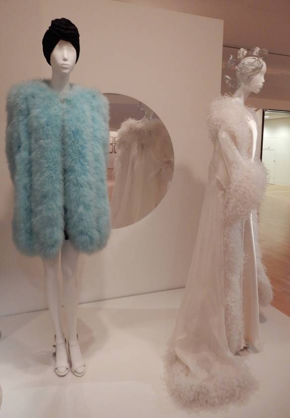 70.(L-R)Yves Saint Laurent, Look 46 coat and dress 1996; Yves Saint Laurent, Look 89 evening dress and robe 2001